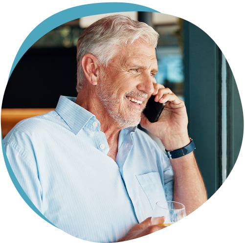 Smiling man talking on the phone